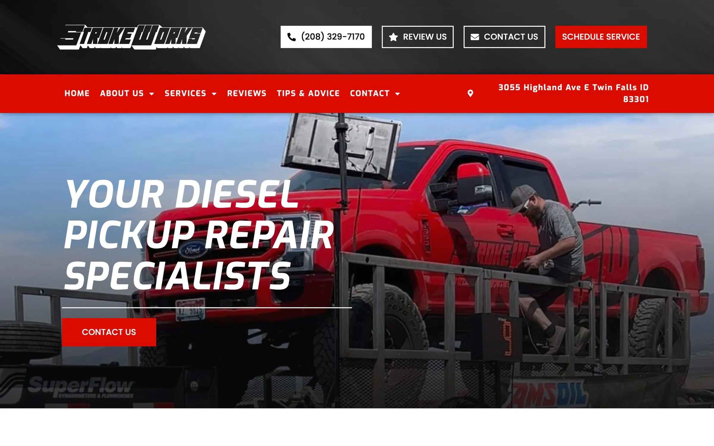 Strokeworks Diesel home page: a mechanic beside a lifted red pickup under the headline “Your Diesel Pickup Repair Specialists”.