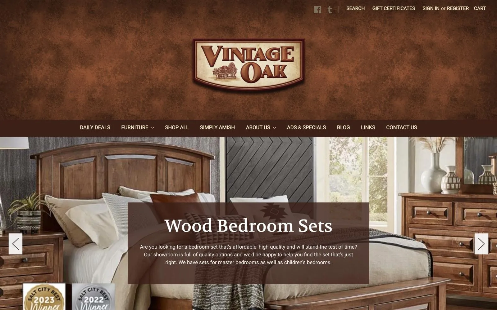 Vintage Oak Furniture home page: the Vintage Oak sign on a rust-brown textured header, above a slide of a wood bedroom set with the headline “Wood Bedroom Sets”.